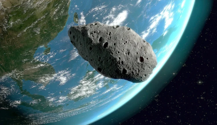 Ilustrace planetky nad povrchem Země