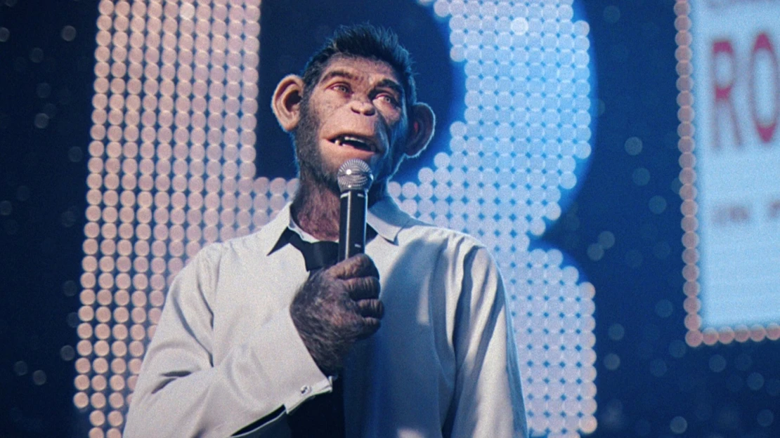 Je tady černý kůň sezony? Ne, spíš opice, která zpívá jako Robbie Williams
